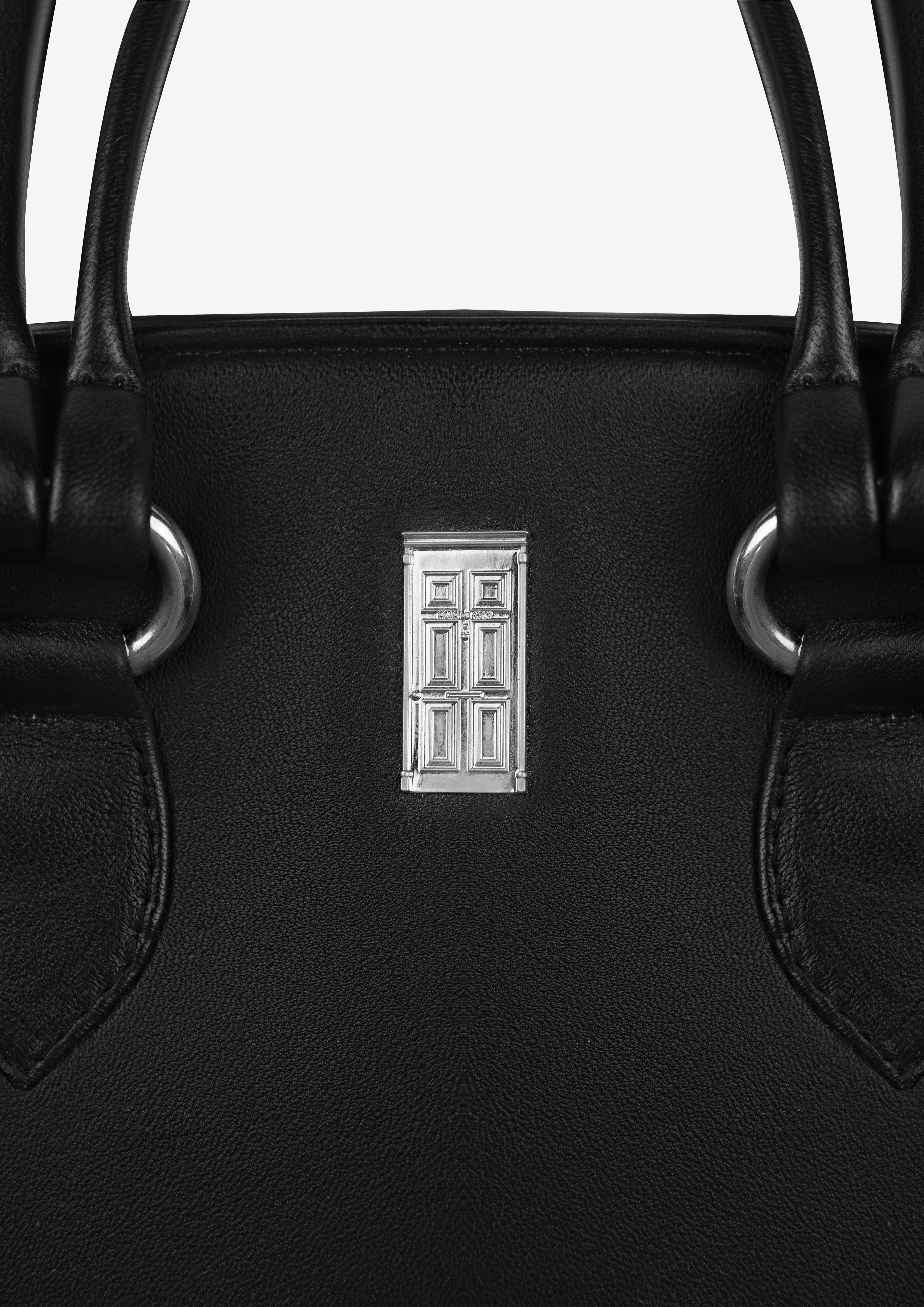 MANHANDLED BAG