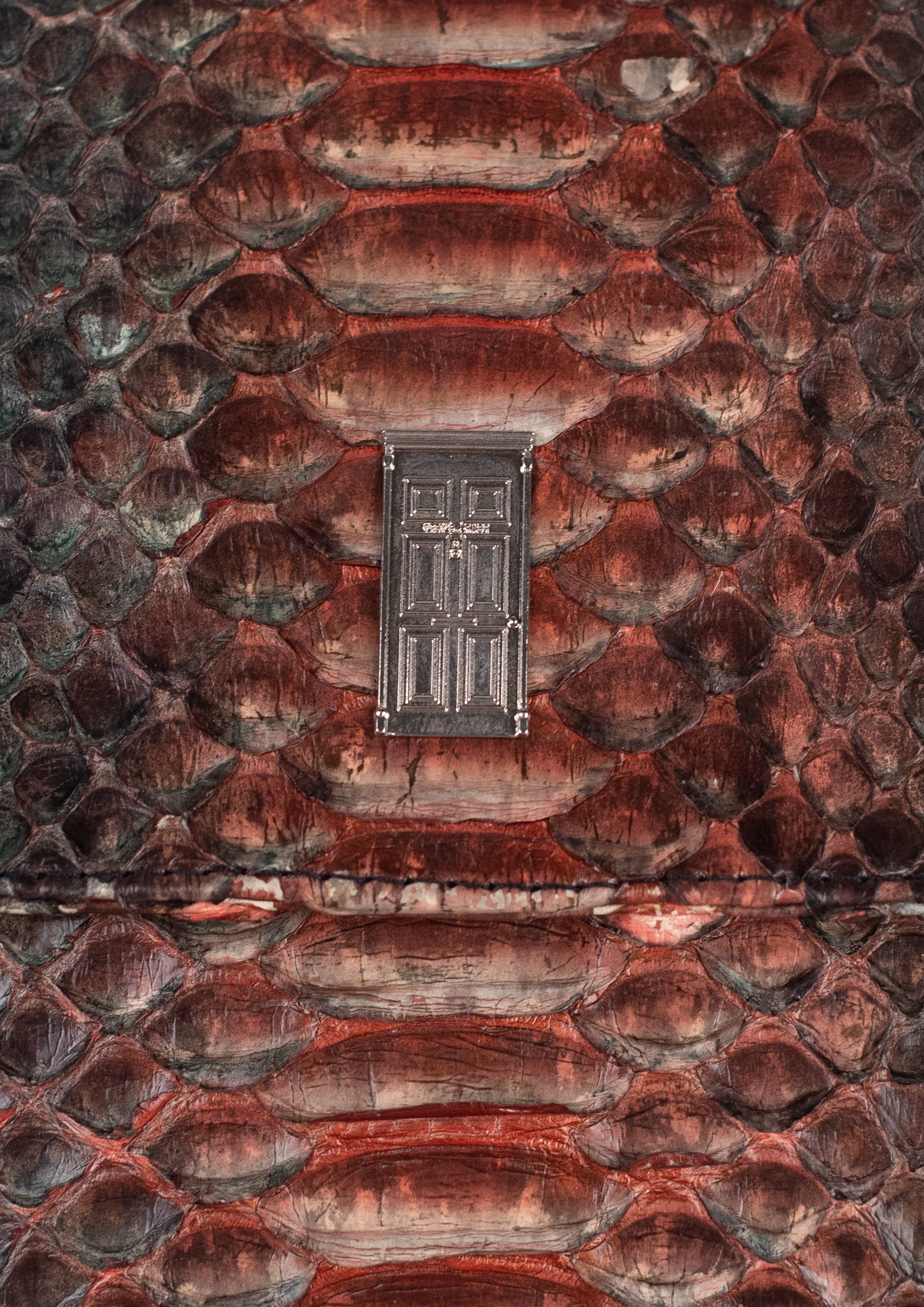 RESTRAINED SNAKESKIN BAG